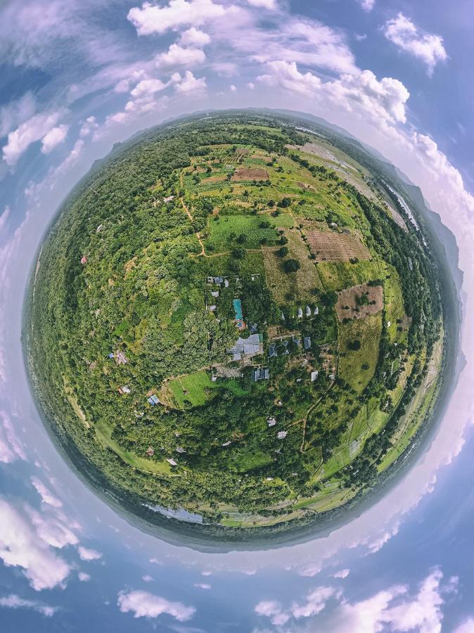 Nivadoo Resort Sigiriya Exterior foto Aerial view of the village